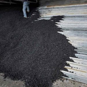 Granulated rubber backstop for gun range